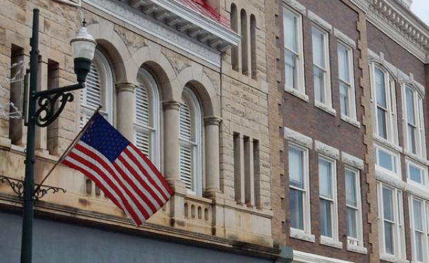 American flag on city lamppost 